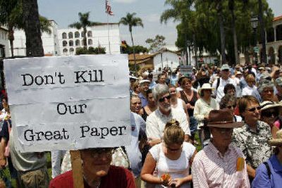 
Members of the community fill De La Guerra Plaza in front of the Santa Barbara News-Press newspaper's office during a rally Tuesday in Santa Barbara, Calif. 
 (Associated Press / The Spokesman-Review)