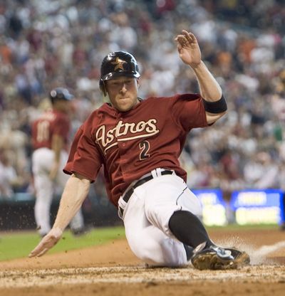 Former Astro Darin Erstad, now coach at Nebraska, said the proper way of sliding needs more emphasis. (Associated Press)