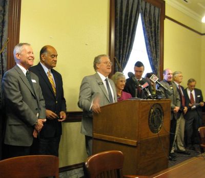 Legislative Democrats, including, from left, Sen. Les Bock, D-Boise; Sen. Edgar Malepeai, D-Pocatello; and Rep. John Rusche, D-Lewiston; give their response to the governor's State of the State message at a Statehouse press conference on Tuesday. (Betsy Russell)