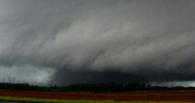 A large tornado sweeps through Limestone County, south of Athens, Ala., near Stewart Road, Wednesday afternoon, April 27, 2011. (Gary Jr / The Decatur Daily)