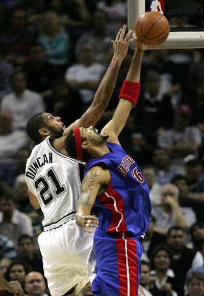 
Detroit's Rasheed Wallace beats San Antonio's Tim Duncan to a rebound. 
 (Associated Press / The Spokesman-Review)