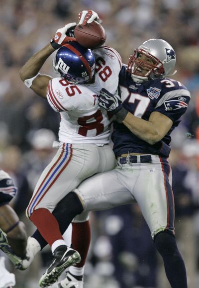 David Tyree’s catch of a ball against his helmet is one of the most-remembered moments of Super Bowl XLII. (Associated Press)