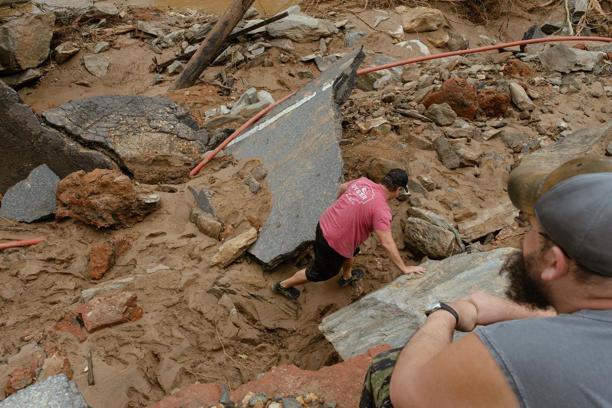 Wreckage caused by Hurricane Helene on Sunday in downtown Marshall, N.C. Authorities in North Carolina were racing on Sunday to find victims and rescue people in mountainous communities in the western part of the state after Hurricane Helene decimated the area with floods and mudslides. 