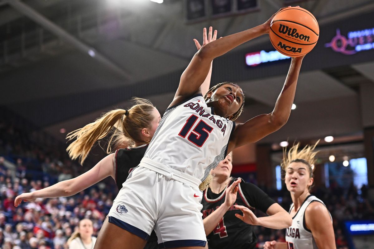 Gonzaga Bulldogs forward Yvonne Ejim (15) goes up for a rebounds against Santa Clara Broncos guard Lara Edmanson (13) in the first half at McCarthey Athletic Center on Sat. Jan. 7, 2023 in Spokane WA. ORG XMIT: IMAGN-491491  (James Snook/For The Spokesman-Review)
