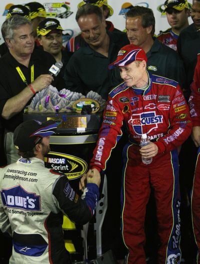 Jimmie Johnson congratulates Mark Martin after the  Subway Fresh Fit 500.   (Associated Press / The Spokesman-Review)