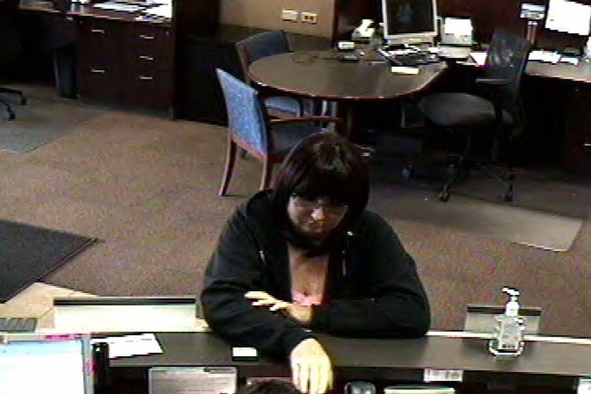 This image shows a woman suspected in a robbery at a Chase Bank branch on West Francis Avenue in Spokane at around noon Monday, May 9, 2011.  Detectives would like to speak with anyone who may have seen her walking on West Francis Avenue between 11 a.m. and 1 p.m. Monday.  Witnesses can reach investigators by calling Crime Check at (509) 456-2233.
