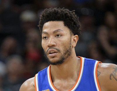 FILE - In this March 25, 2017, file photo, New York Knicks' Derrick Rose stands on the court during a free throw attempt in the first half of an NBA basketball game against the San Antonio Spurs, in San Antonio. A person familiar with the negotiations says the Cleveland Cavaliers have discussed a contract with former NBA MVP Rose. (Darren Abate / Associated Press)