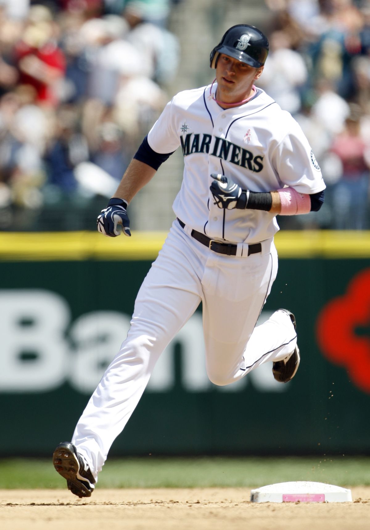 Michael Saunders rounds second after hitting his first major league home run. (Associated Press)