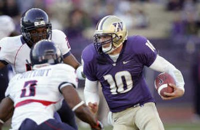 
Washington quarterback Jake Locker increases his injury chances because of his running ability. Associated Press
 (Associated Press / The Spokesman-Review)