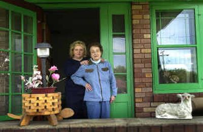 
Phyllis Wardle and her mother, Rose Chesurin, stand in the doorway of the Sprague Avenue home. The family used to own the Casa Loma Motel, built in the 1920s, and has lived along Sprague for decades. 
 (Brian Plonka / The Spokesman-Review)