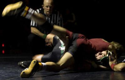 
Brian Owen gets University off to a fast start with a pin of East Valley's Shelby Lawson in the 112-pound division. 
 (Holly Pickett / The Spokesman-Review)