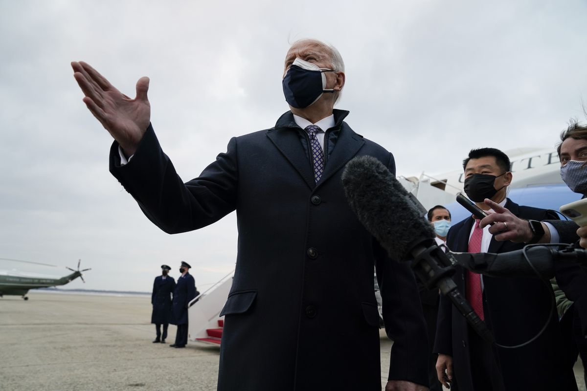 President Joe Biden speaks to member of the media after exiting Air Force One, Friday, Feb. 19, 2021, in Andrews Air Force Base, Md.  (Evan Vucci)