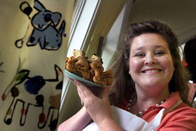 
Rebecca Kalch, owner of Four Paws Bakery, offers Barkday and Bark Mitzvah cakes, and homemade treats with names like Pupparoni and PNut-Butter Pudy-Tat's and pet meals. 
 (The Spokesman-Review)
