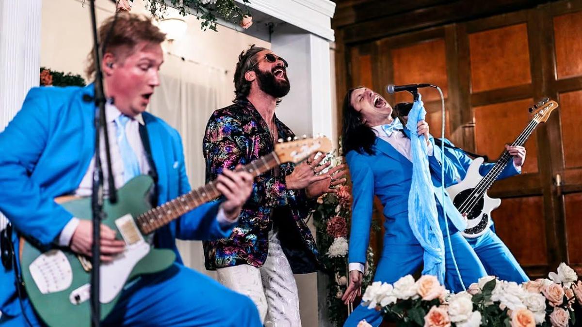 Local band Nothing Shameful and Andrew Wells, center, lead singer of Dance Gavin Dance, film a music video for their song “Pine Grove” at the Hill House Event Center.  (Courtesy)