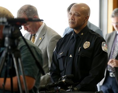 Charlottesville Police Chief Al S. Thomas Jr. listens to Attorney Timothy Heaphy as he delivers an independent report on the issues concerning the white supremacist rally and protest in Charlottesville, during a news conference in Charlottesville, Va., Friday, Dec. 1, 2017. (Steve Helber / Associated Press)