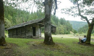 
In this 2005 photo, a lower Rogue River rafter takes a break in front of a cabin on property owned by Western writer Zane Grey near Grants Pass, Ore. Associated Press
 (Associated Press / The Spokesman-Review)