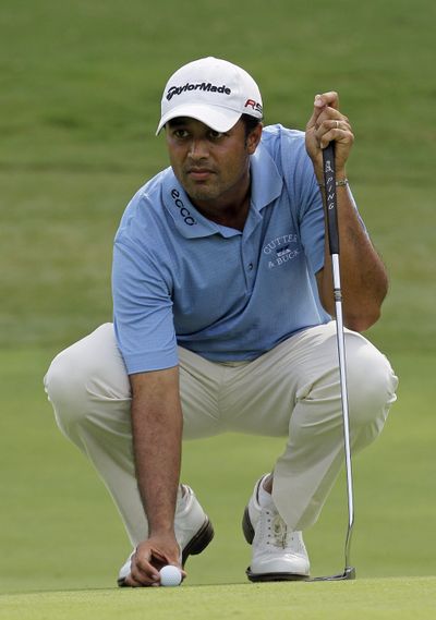 Arjun Atwal shot a 65 for a 3-stroke lead at the Wyndham.  (Associated Press)