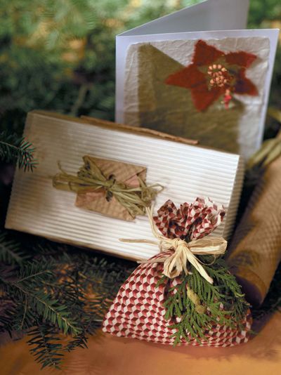 Recycled paper products and natural greenery used in holiday decorations have minimal environmental impact. HGTV (HGTV)