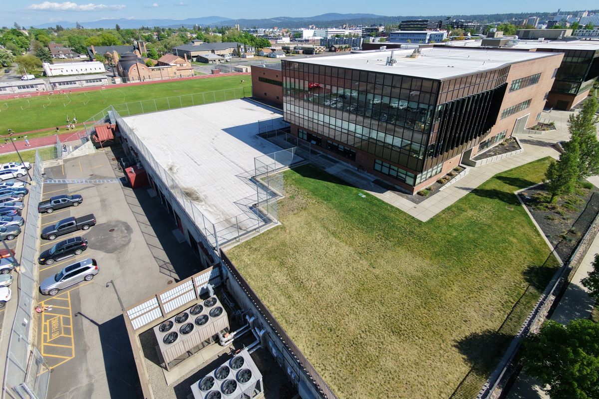 On the north end of North Central High School in Spokane, a parking structure is planned as part of a major redesign of the campus, with construction by Bouten Construction.  (Jesse Tinsley/THE SPOKESMAN-REVI)