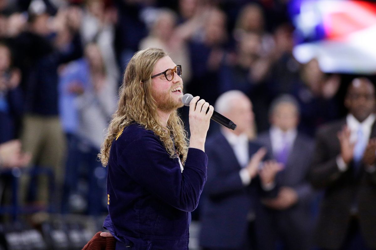 Allen Stone sings the national anthem before an NCAA basketball game between Gonzaga and North Carolina in Spokane on Dec. 18, 2019.  (Young Kwak/Associated Press)