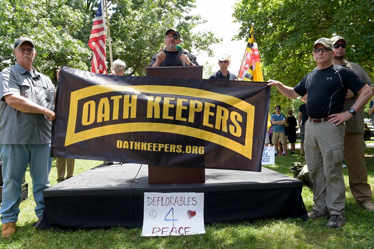 FILE - Stewart Rhodes, founder of the citizen militia group known as the Oath Keepers, center, speaks during a rally outside the White House in Washington, on June 25, 2017. The seditious conspiracy case filed this week against members and associates of the far-right Oath Keepers militia group marked the boldest attempt so far by the government to prosecute those who attacked the U.S. Capitol during the Jan. 6 riot.  (Susan Walsh)