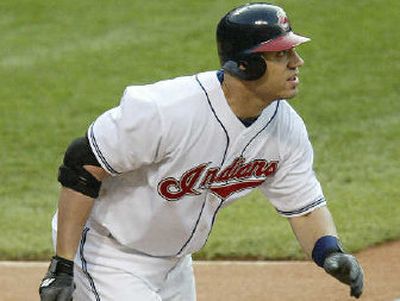 Cleveland Indians' Travis Hafner watches his grand slam on Friday.
(Associated Press / The Spokesman-Review)