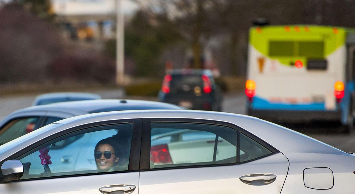A driver makes her way through the entrance between IHOP and Buffalo Wild Wings on East Indiana Avenue in front of Spokane Valley Mall on Thursday. (Kathy Plonka / The Spokesman-Review)