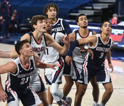 Gonzaga players from left, Matthew Lang, Pavel Zakharov, Joel Ayayi, Anton Watson, Colby Brooks and Andrew Nembhard vie for a rebound during Kraziness in the Kennel last November inside a nearly empty McCarthey Athletic Center.  (Dan Pelle/The Spokesman-Review)