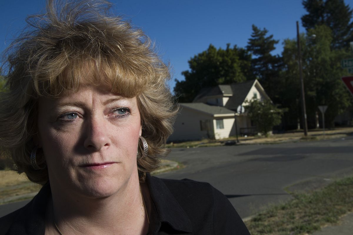Teresa Juneau-Simon was among the neighbors who coped with a chronic nuisance home in the Underhill Park area of east Spokane. “This is life-threatening,” she said before the family was evicted. (Colin Mulvany)