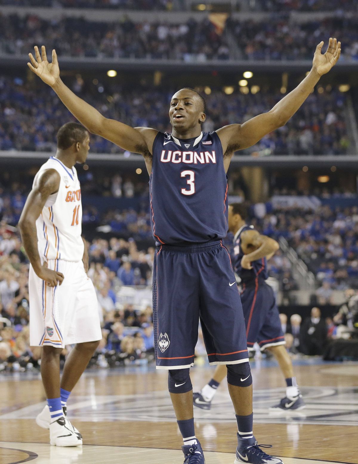 Connecticut guard Terrence Samuel celebrates during the second half of Huskies’ NCAA Final Four win. (Associated Press)