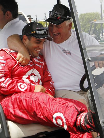 Mark Tardugno hugs Juan Pablo Montoya after Montoya won the pole for today’s Sprint Cup Series race. (Associated Press)