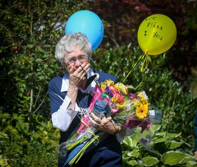 Sister Rosalie Locati is overcome with joy as she see friends at a reception after a big send-off parade for her retirement.  (DAN PELLE/THE SPOKESMAN-REVIEW)