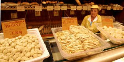 
Pasta and bread are on sale at a shop in downtown Milan on Wednesday. Consumer groups are calling for a one-day pasta strike today — not against eating it, but against buying it — to protest a price increase of up to 20 precentAssociated Press
 (Associated Press / The Spokesman-Review)