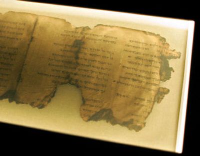 
 A portion of the Dead Sea Scroll Psalms is displayed at the Pacific Science Center in Seattle last week. 
 (Associated Press / The Spokesman-Review)