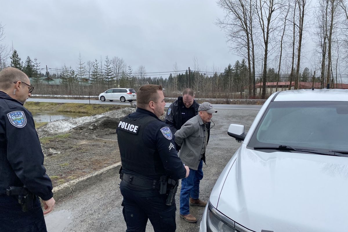 Sandpoint police arrest Dave Bowman outside the Bonner County offices Feb. 6 after he refused to leave the commissioners meeting.  (James Hanlon/The Spokesman-Review)