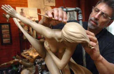 
Steve Gevurtz works on his clay sculpture, Winds of Desire, at his downtown Spokane studio. Gevurtz, who retired as CEO of Itronix two years ago, began sculpting in 2005.
 (Photos by INGRID BARRENTINE / The Spokesman-Review)