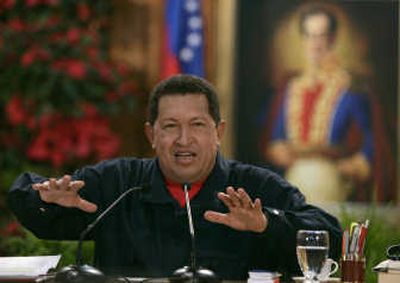 
Venezuelan President Hugo Chavez speaks with the foreign media at Miraflores presidential palace in Caracas on Saturday. Associated Press
 (Associated Press / The Spokesman-Review)