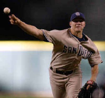
San Diego's Jake Peavy delivers a strikeout pitch in the first. 
 (Associated Press / The Spokesman-Review)
