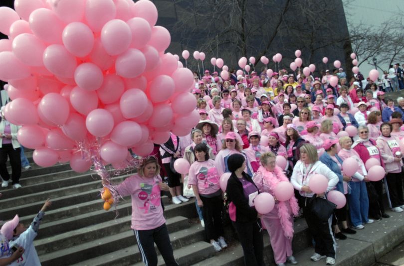 Breast cancer survivors gathered on the steps of the INB Performing Arts Center (Spokane Opera House) for a 