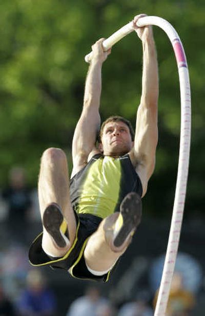 
University HS graduate Brad Walker soars his way to victory in the pole vault with a mark of 18 feet, 8 ¼ inches Friday.Associated Press
 (Associated Press / The Spokesman-Review)