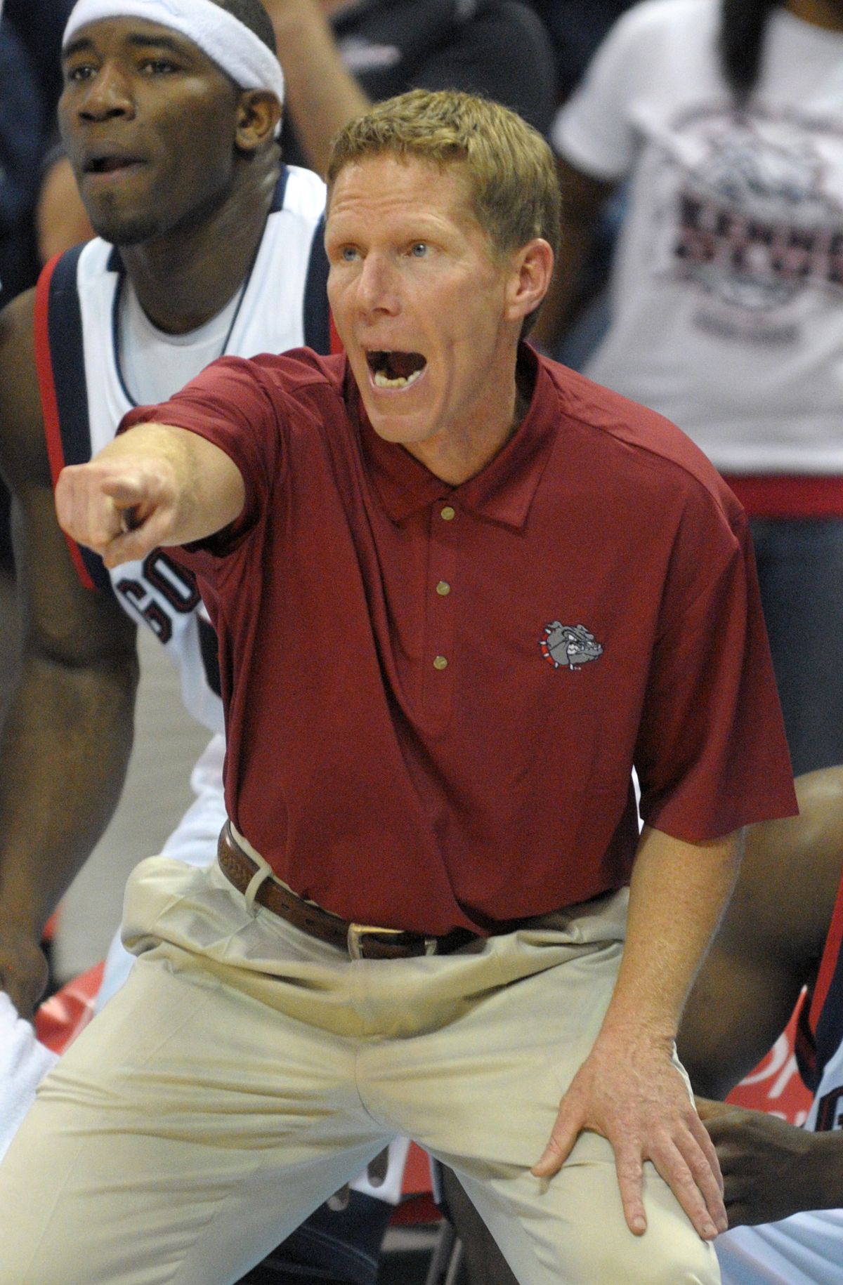 Coach Mark Few offers some directions for the Bulldogs.  (Associated Press / The Spokesman-Review)