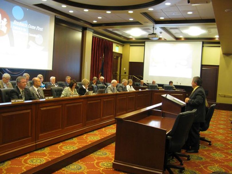 State schools chief Tom Luna addresses a joint meeting of the House and Senate education committees Tuesday, giving an update on his 