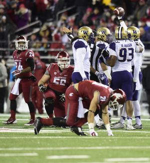 Washington reacts after a turnover on downs  during the first half of the 2014 Apple Cup on Saturday, Nov 29, 2014, at Martin Stadium in Pullman, Wash. (Tyler Tjomsland / The Spokesman-Review)