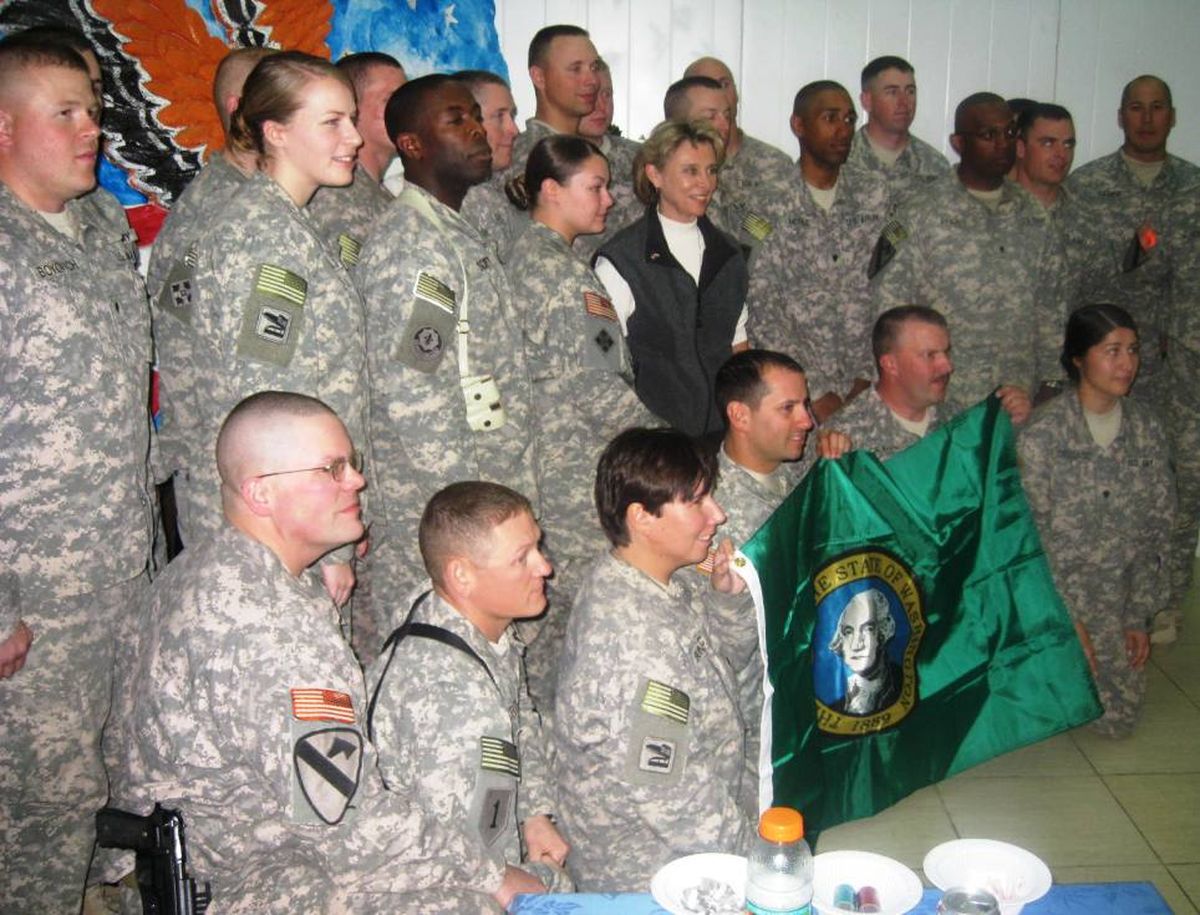 Gov. Chris Gregoire stands with soldiers Tuesday in Baghdad in an image released by the Washington state Secretary of State’s Office.  (Associated Press / The Spokesman-Review)