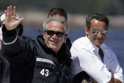 
President Bush and French President Nicolas Sarkozy smile during a boat ride Saturday off Kennebunkport, Maine.  Associated Press
 (Associated Press / The Spokesman-Review)