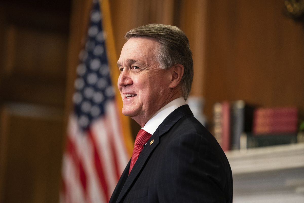 Sen. David Perdue, R-Ga., meets with Judge Amy Coney Barrett, President Donald Trumps nominee for the U.S. Supreme Court, not pictured, on Capitol Hill in Washington, Wednesday, Sept. 30, 2020.  (Ken Cedeno)