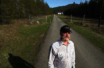 
Bat Masterson stands near the site of the proposed Rickel Ranch development near Silverwood Theme Park. He represents a group opposed to the project. 
 (Kathy Plonka / The Spokesman-Review)