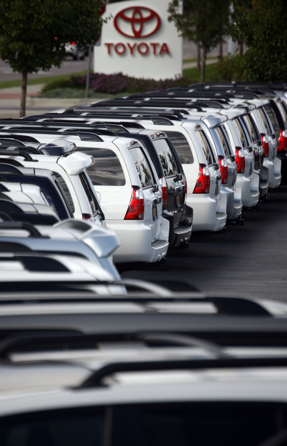A line of 2008 4Runners at a Toyota dealership in Lakewood, Colo., are testimony to sluggish auto sales. (David Zalubowski / The Spokesman-Review)