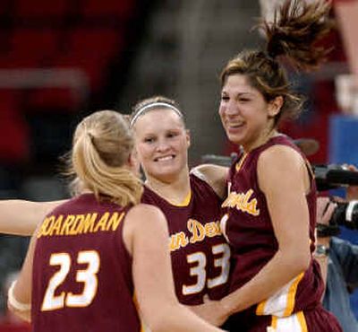 
ASU's Betsy Boardman (23), Amy Denson (33) and CV grad Emily Westerberg celebrate after beating Notre Dame.
 (Associated Press / The Spokesman-Review)