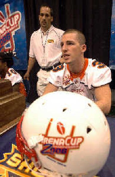 
Shock quarterback Kyle Rowley and coach Chris Siegfried make a pitch Friday for today's ArenaCup game. 
 (Rafi Cordero MB Sports / The Spokesman-Review)